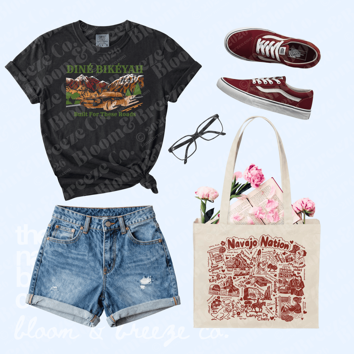 Outfit flat lay on light blue background with Black vintage t-shirt, shorts, maroon shoes and canvas tote