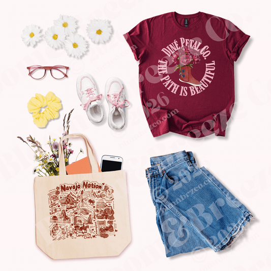Maroon t-shirt with floral design, blue jeans, beige tote bag with Native American design, white sneakers with pink bows, yellow hair scrunchie, and glasses on a white background.