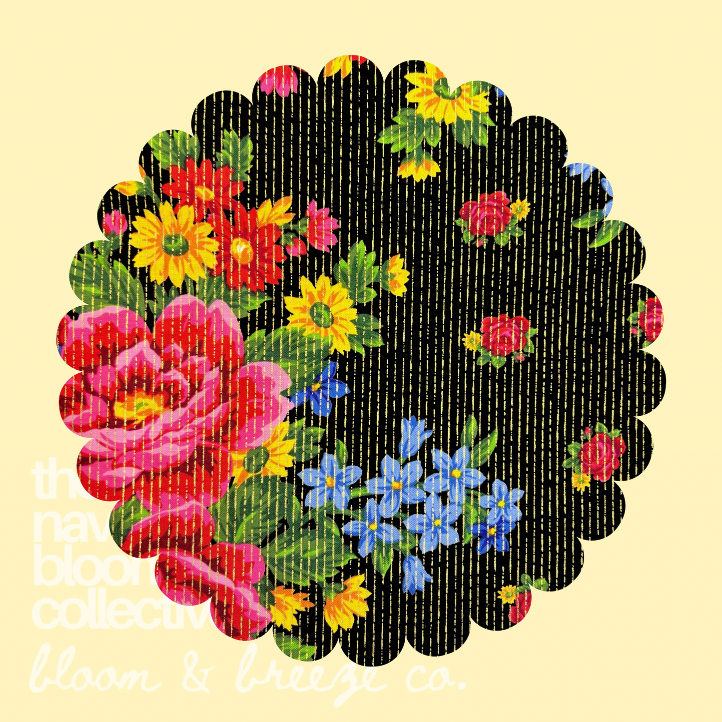 Black fabric swatch with bright pink, red, yellow, blue, and green floral print with gold stripe details on a pale yellow background.