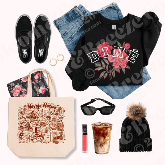 Collection of fashion and lifestyle items including the dine blossom black sweatshirt with floral design, tote bag, sunglasses, and coffee cup.