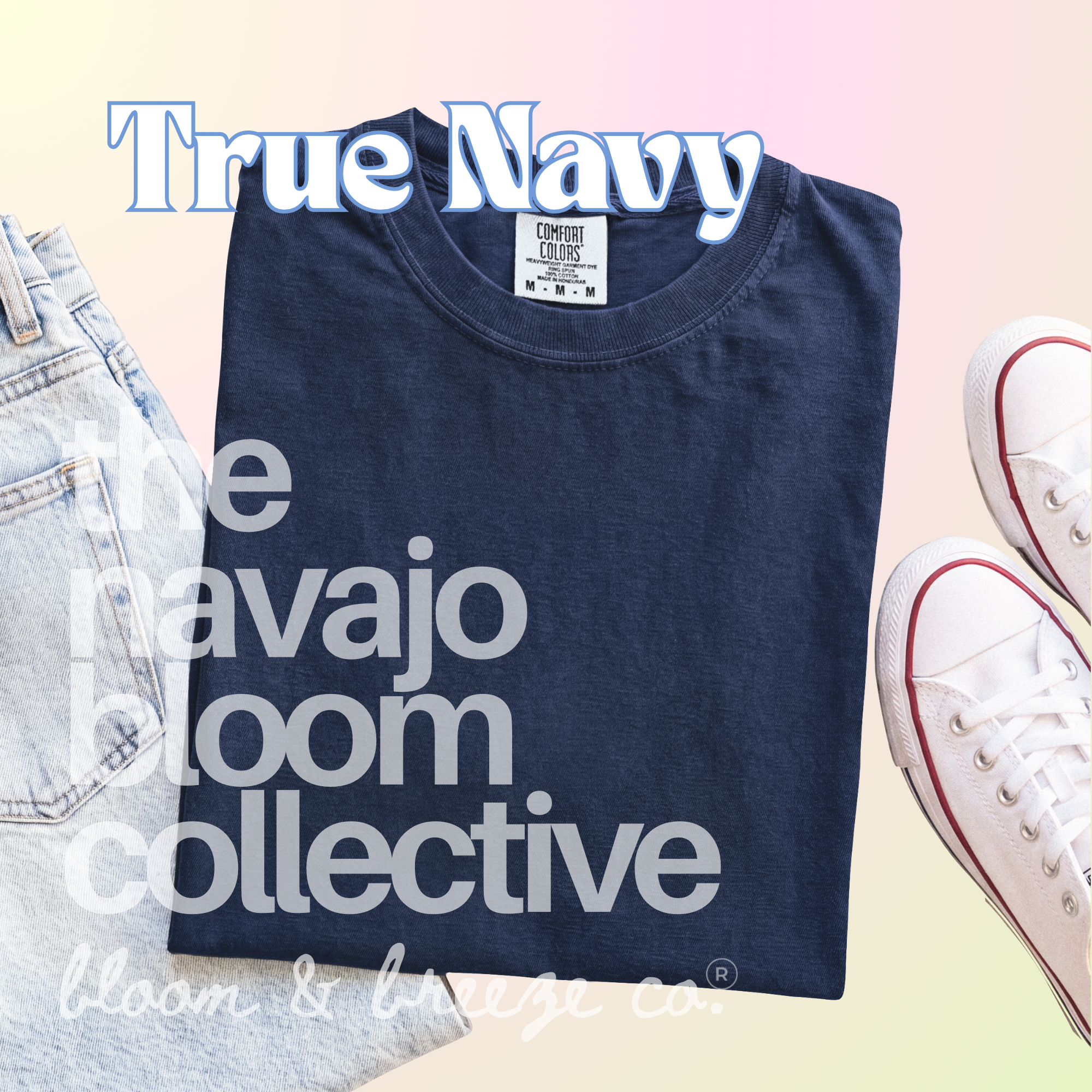 Dark navy colored comfort colors flatlay with jeans and sneakers