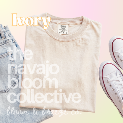 Ivory comfort colors flatlay with jeans and sneakers