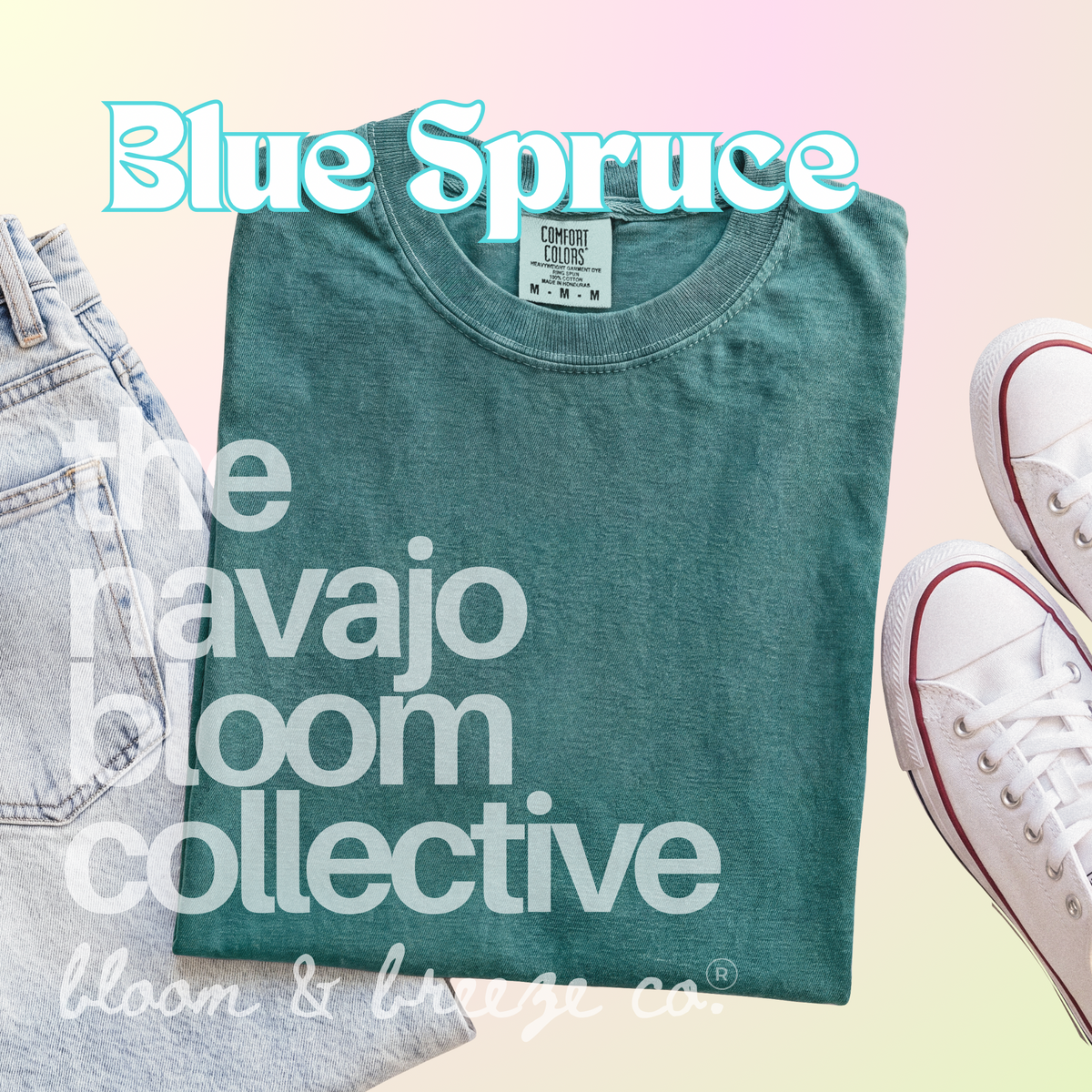 Dark bluish green colored comfort colors flatlay with jeans and sneakers