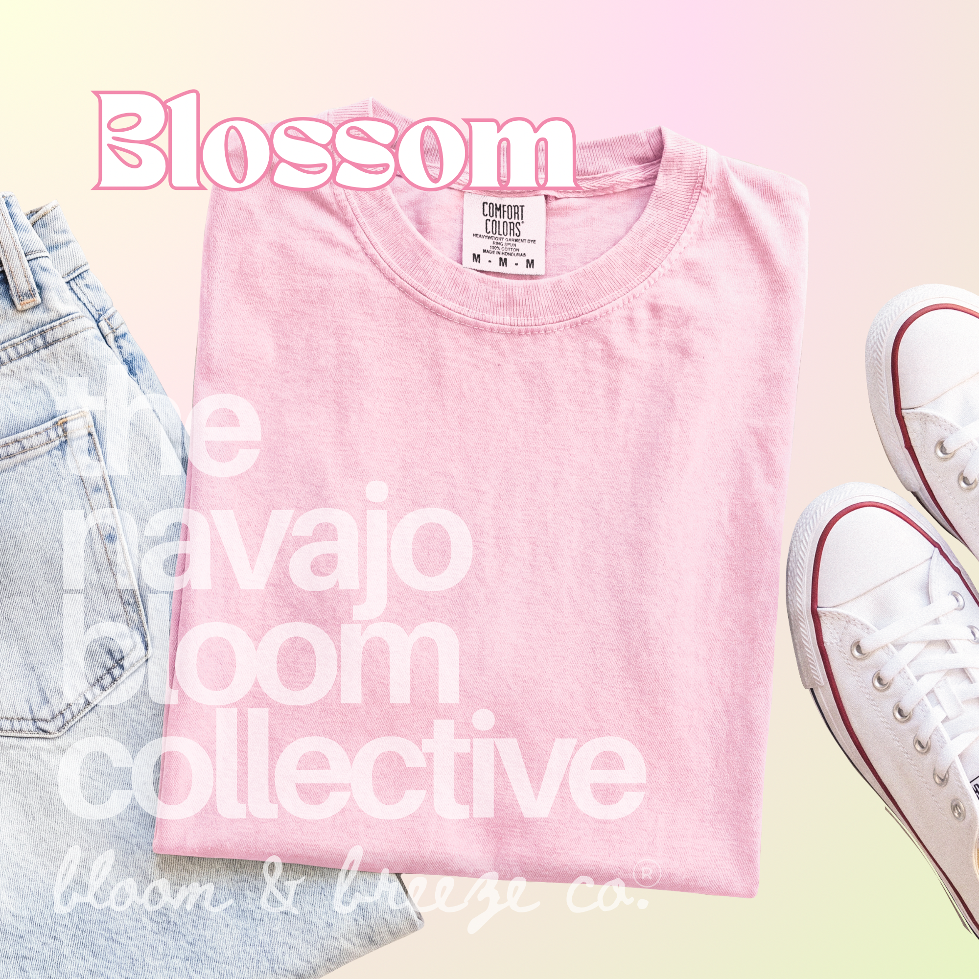 Light pink colored comfort colors flatlay with jeans and sneakers