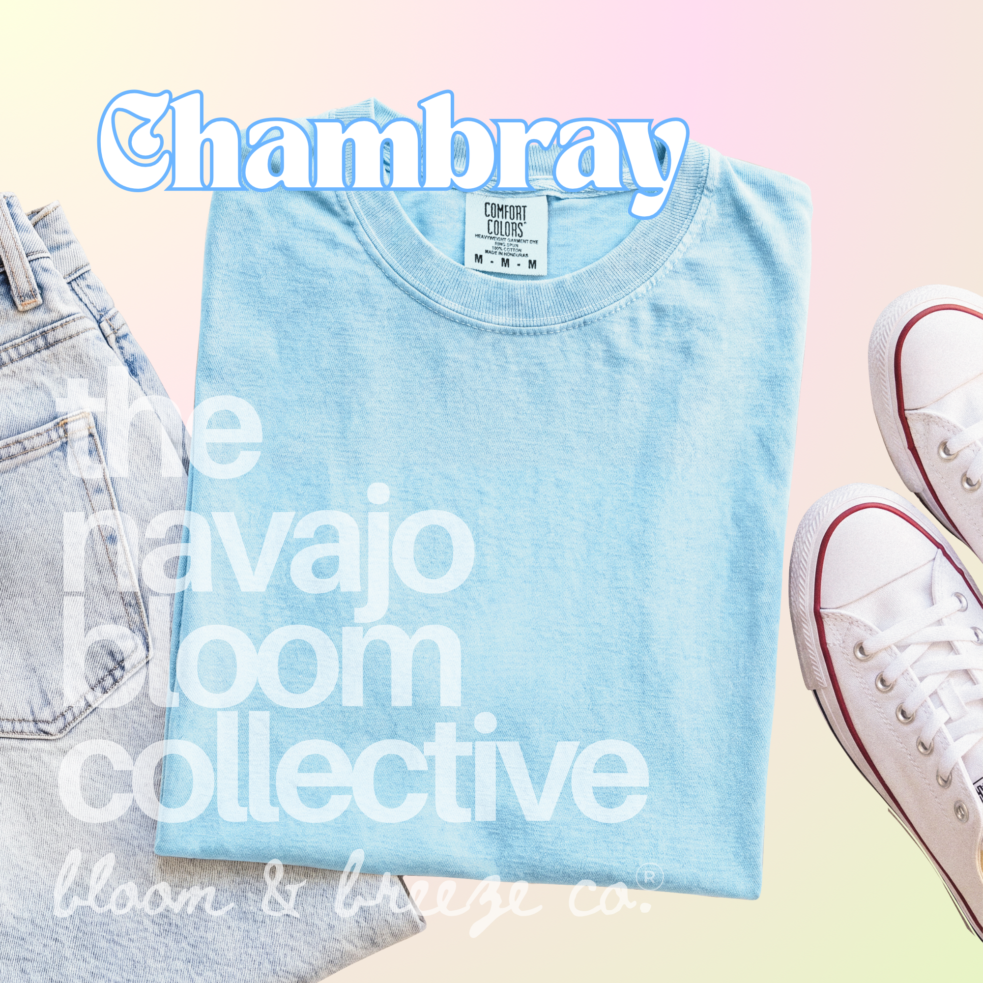 Light blue colored comfort colors flatlay with jeans and sneakers