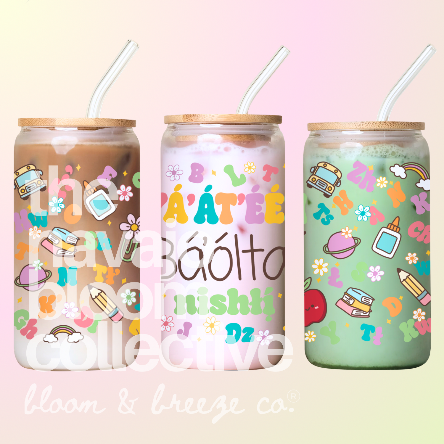 Three tall clear glass tumblers with bamboo lids and clear straws, filled with iced drinks and decorated with colorful school-themed illustrations. The tumblers are shown against a soft pastel gradient background with a large 'the navajo bloom collective' text overlay and 'bloom & breeze co.