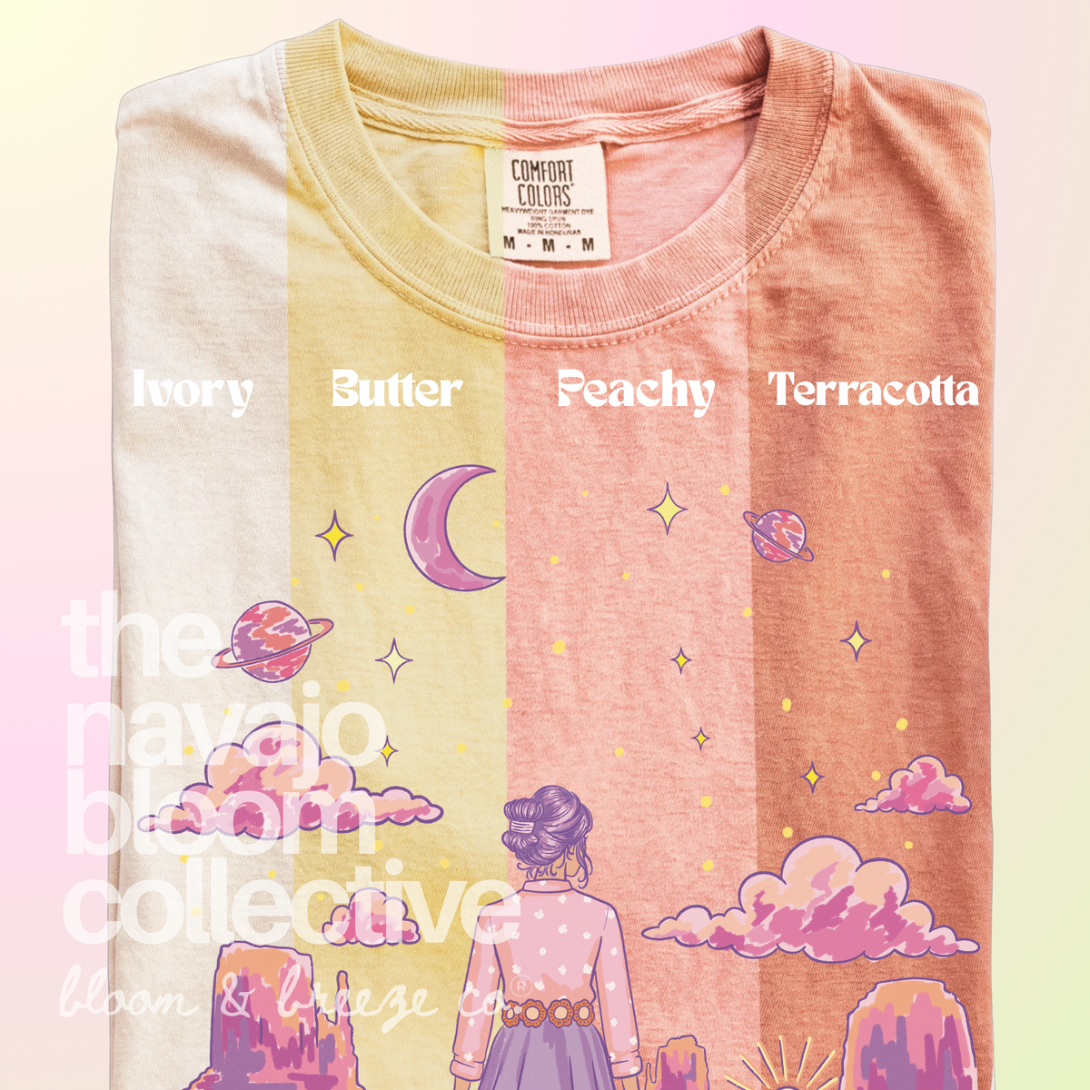 Starry Eyed Dreamer woman, desert mesas, moon, and planets design on a Comfort Colors tee, comparing Ivory, Butter, Peachy, and Terracotta.