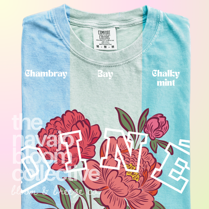 Diné Blossom floral tee in Chambray, Bay, and Chalky Mint.