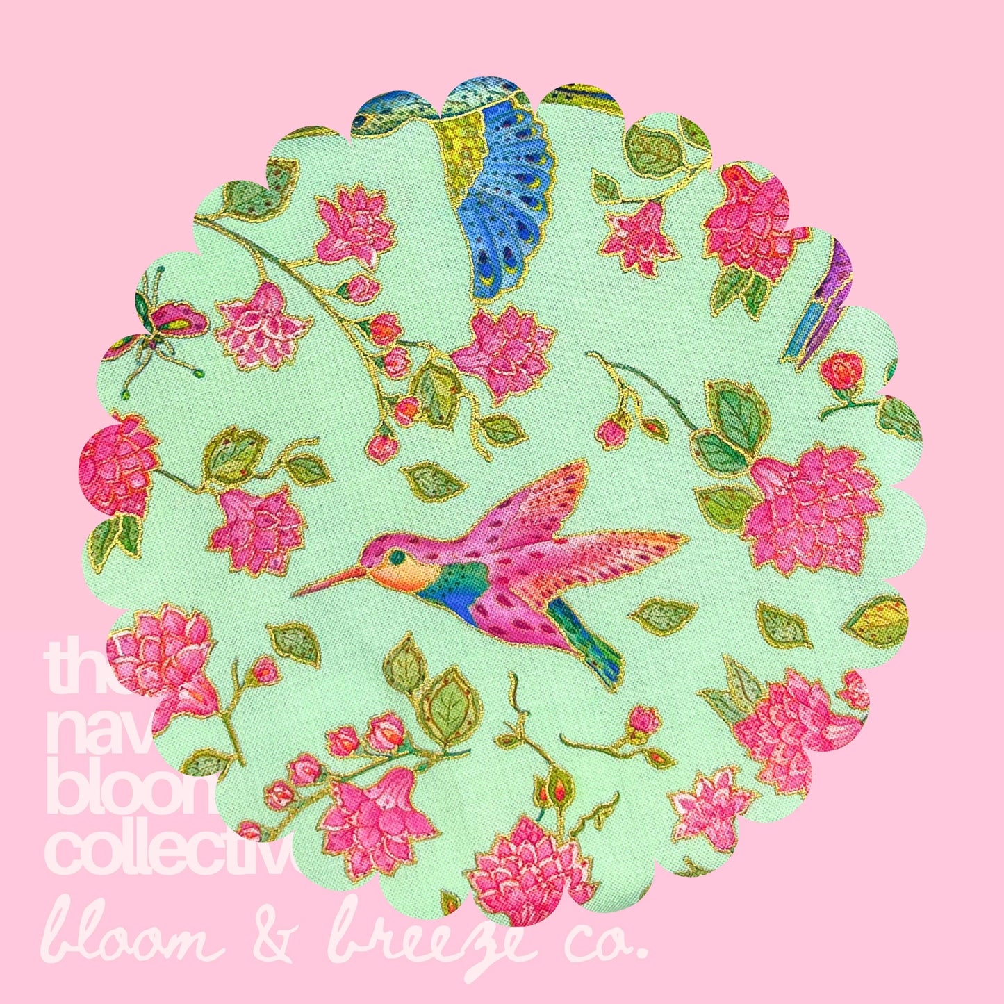 Mint hummingbird floral fabric swatch on a pink background with Bloom and Breeze branding.
