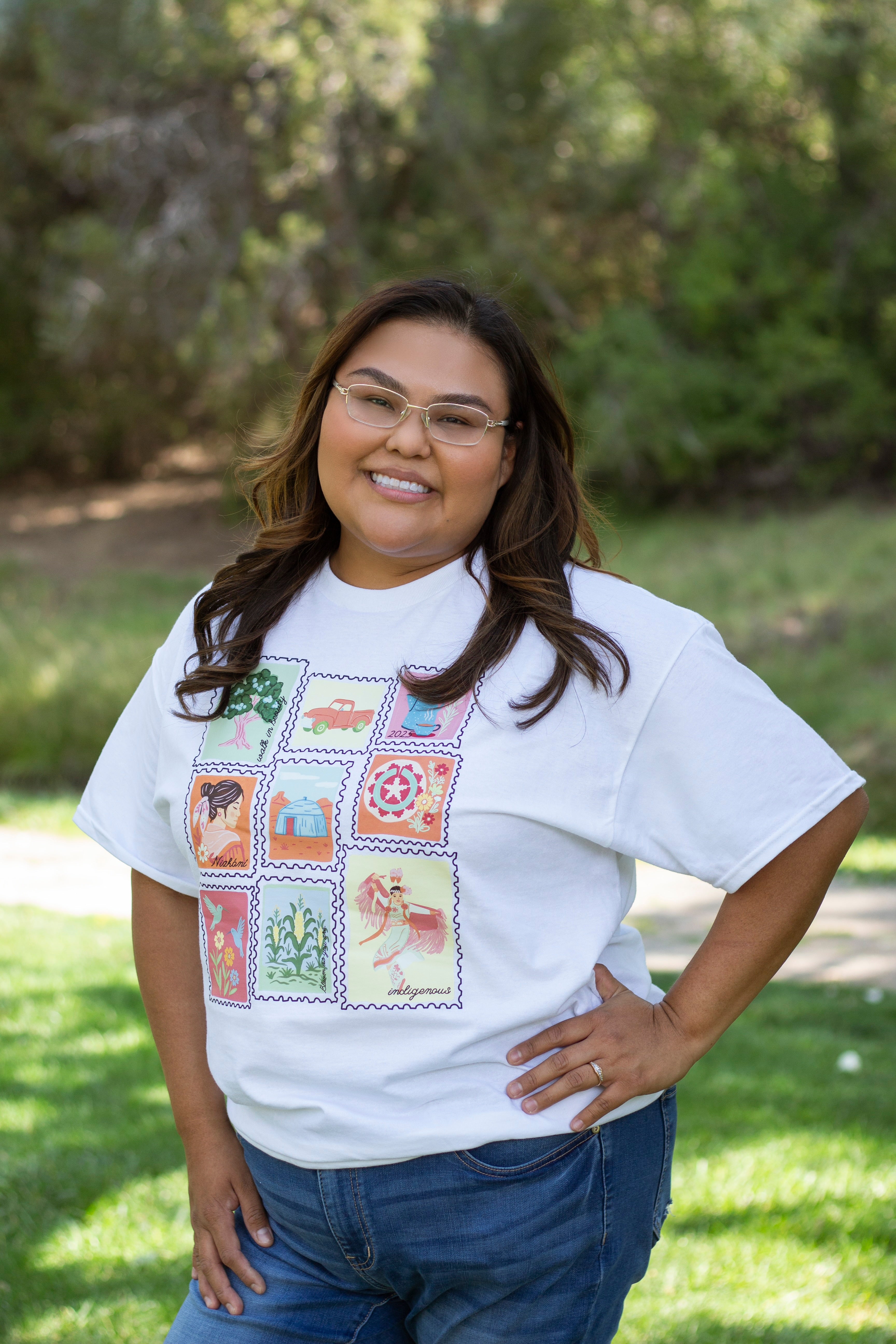 Kamiah the owner of Bloom and Breeze Co. wearing her signature design, Dear Nizhoni