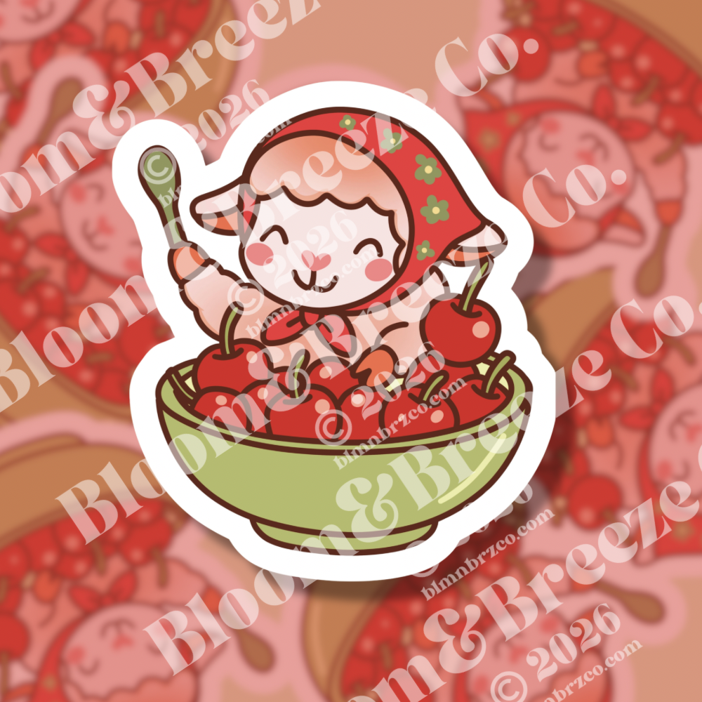 Cute lamb wearing a red headscarf sitting in a green bowl filled with red cherries