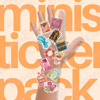 Hand with various mini stickers against a background with text