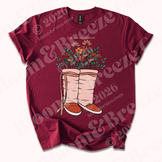 Maroon t-shirt with floral Moccasin design on a white background