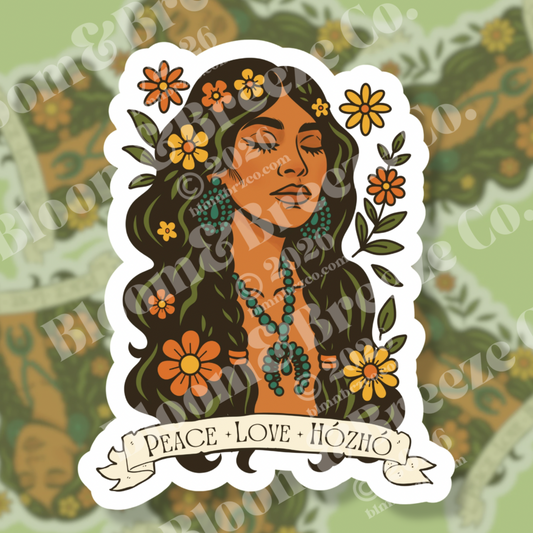 Peace, Love, Hózhó sticker featuring an Indigenous woman with long dark hair, turquoise jewelry, and surrounding orange and yellow flowers, with a banner reading ‘Peace + Love + Hózhó