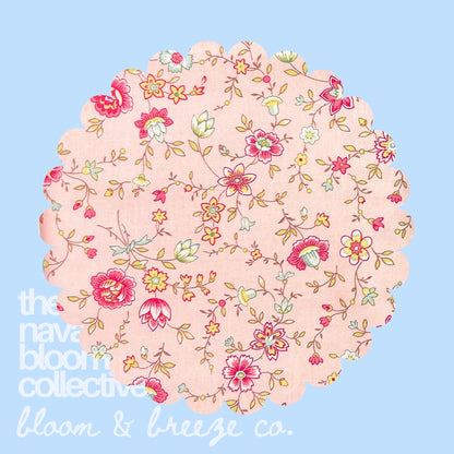 blush pin floral fabric swatch on a soft Blu bloom and breeze background