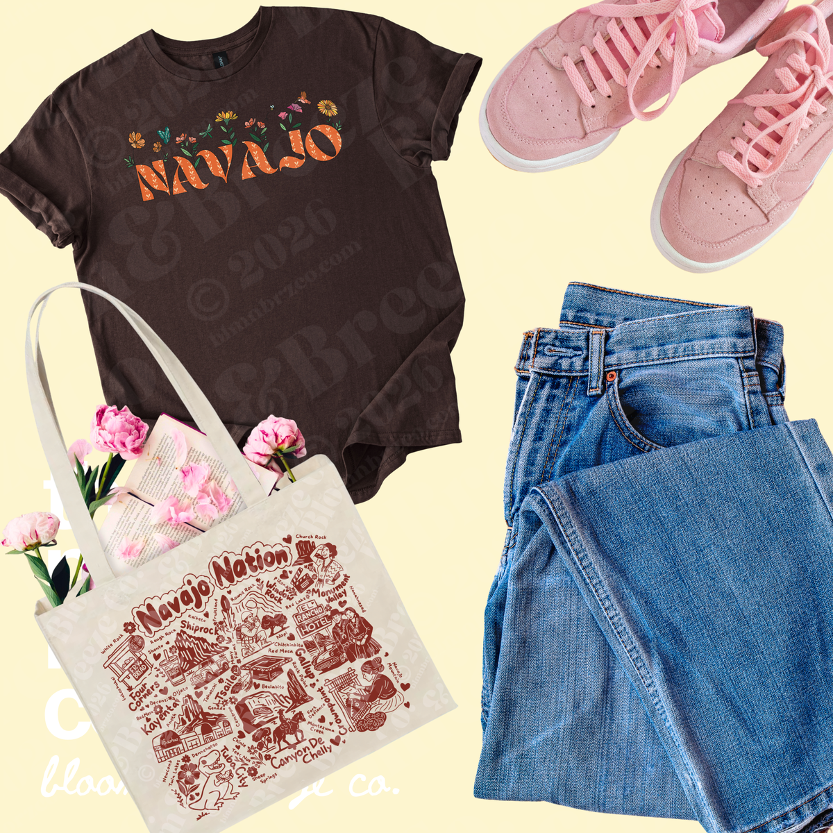 A styled flat-lay outfit featuring a dark brown graphic t-shirt with 'NAVAJO' text, a cream canvas tote bag with a red 'Navajo Nation' illustration, folded blue jeans, and a pair of pink sneakers, arranged on a pale yellow background.