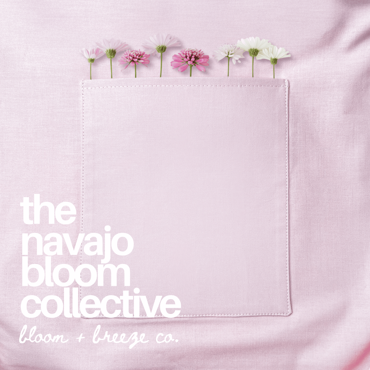Close-up of a pale pink  pocket decorated with delicate pink and white flowers, featuring “The Navajo Bloom Collective” branding.