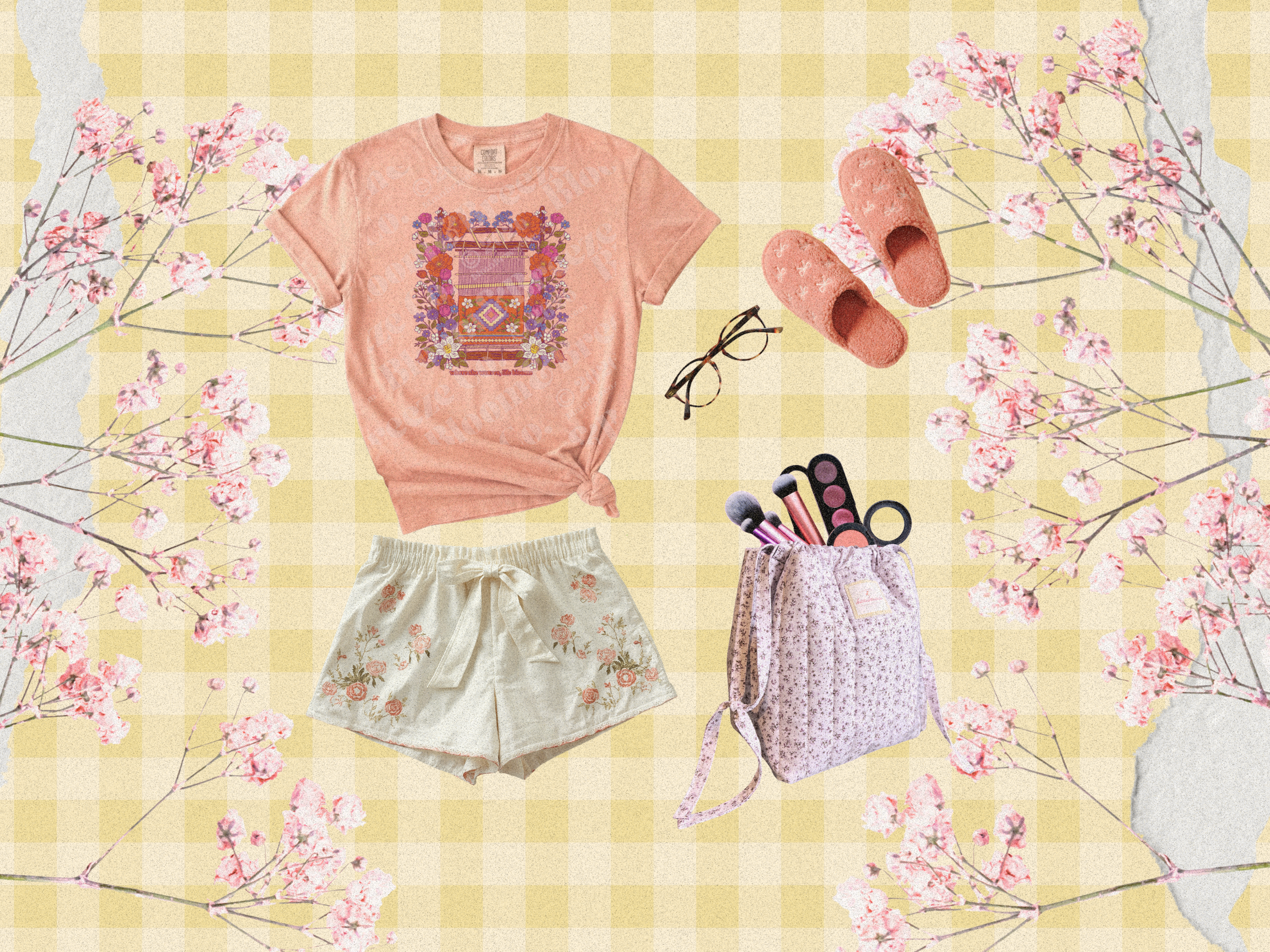 Peach colored pajama set with glasses slippers and makeup bag flat lay on plaid yellow and white background with wild flowers framing it